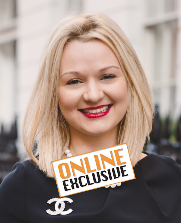 Dr Uliana Gout photo with Online Exclusive stamp.