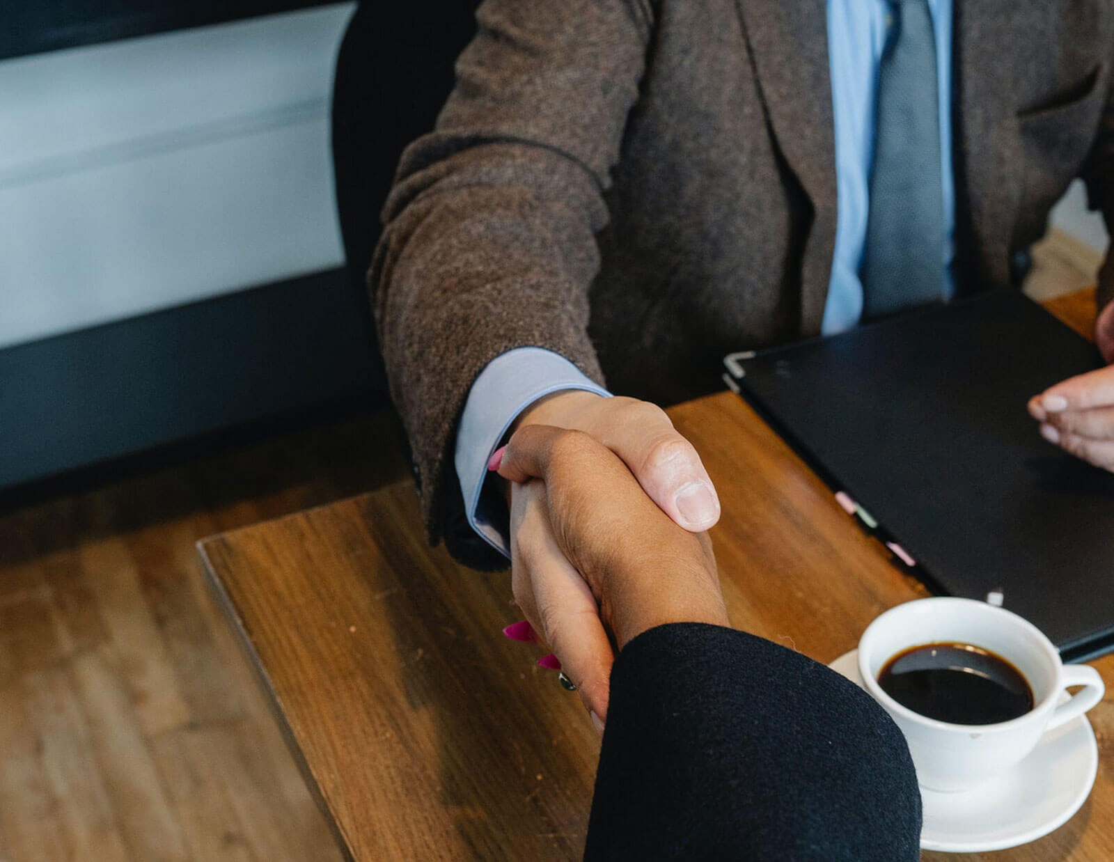 Image of people shaking hands. 