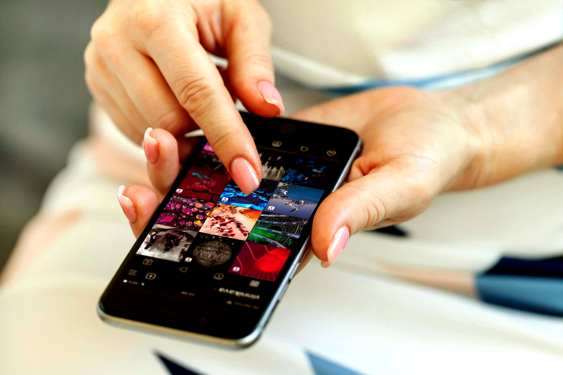 Photo of person using Istagram reel on phone.