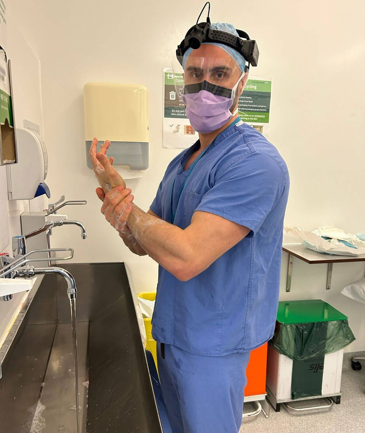 Photo of James Olding preparing for theatre. 