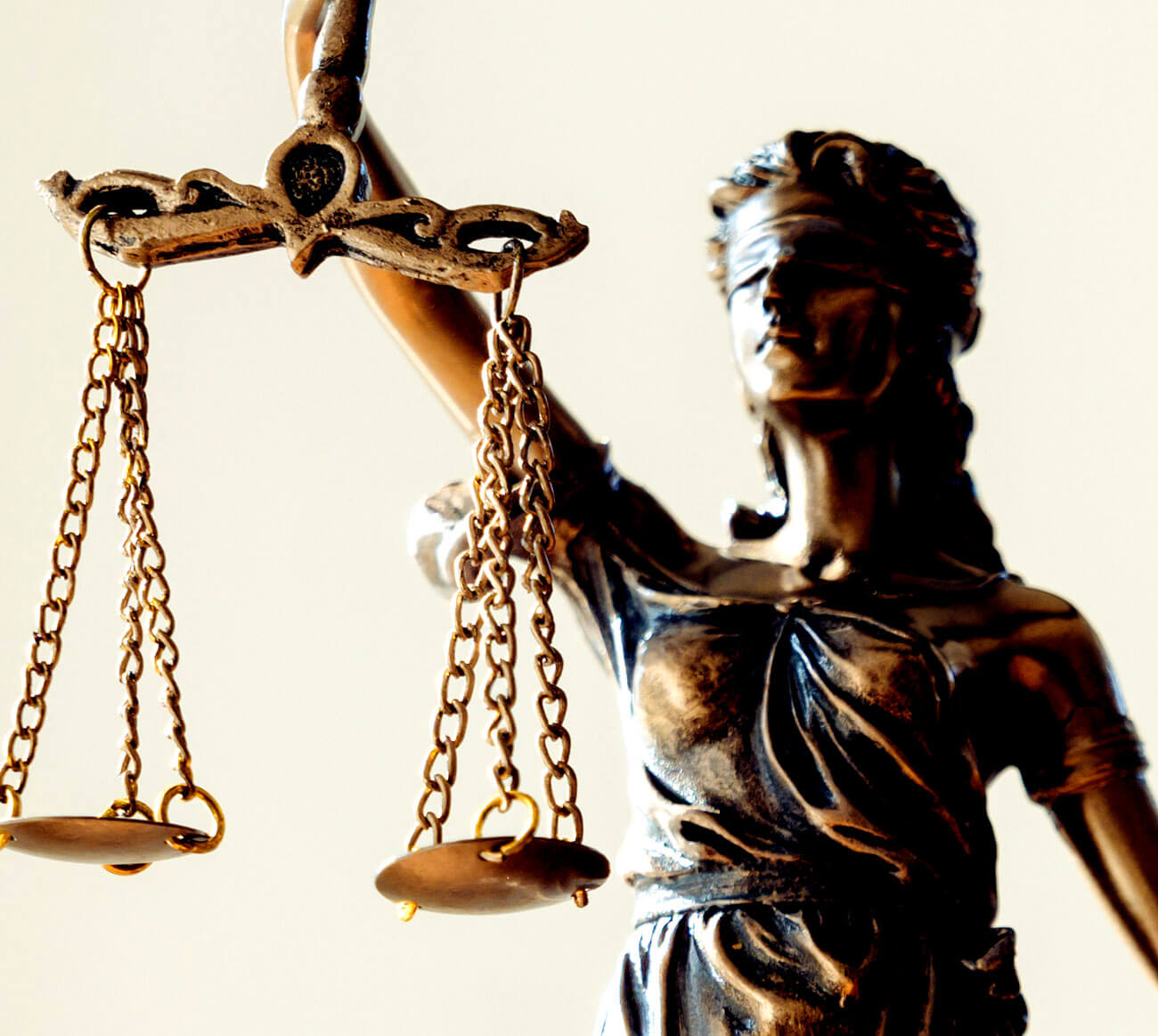 Photo of scales of justice figurine. 