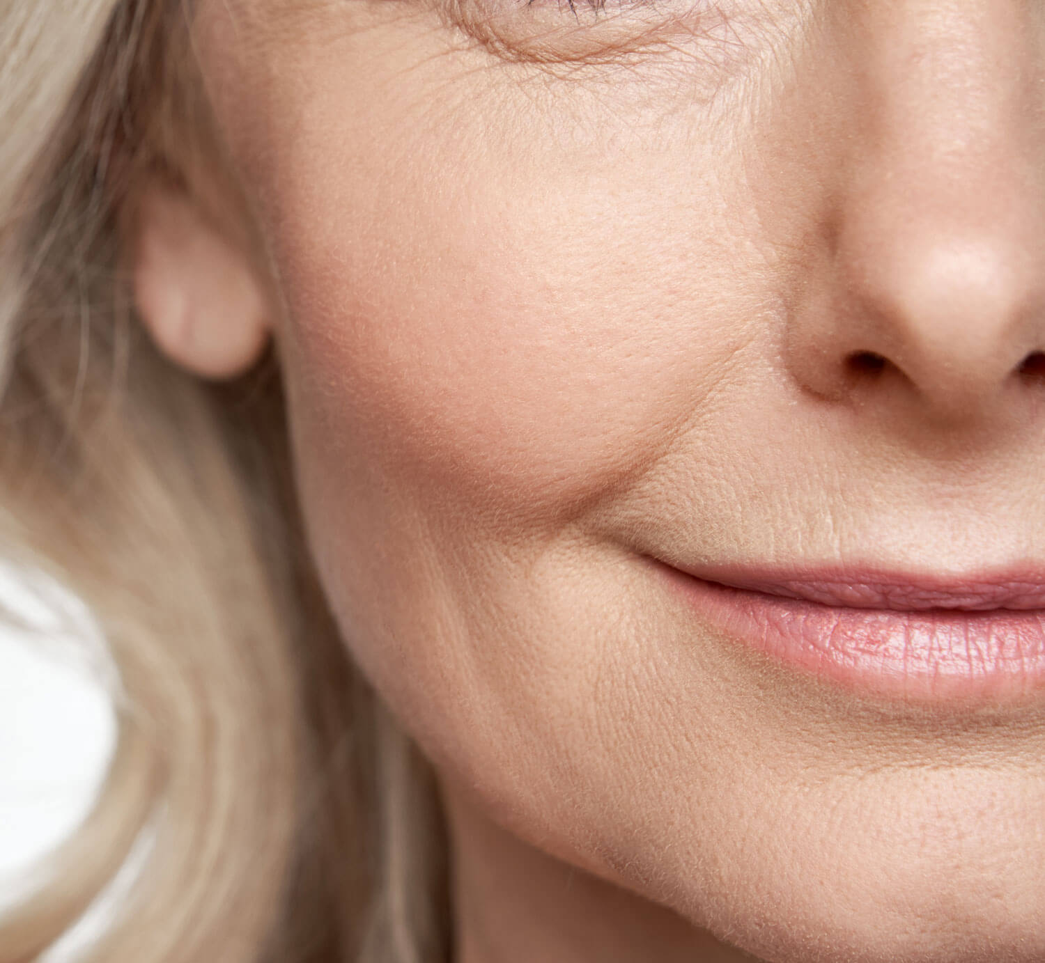 Close up image of woman's face.